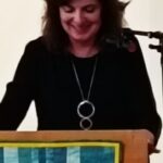 Ein Bild von Frau Wengert-Richter am Podest.